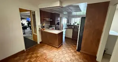 Kitchen ceiling opened up so a leak from above can dry out